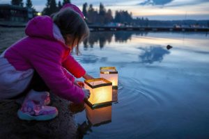 Ponderosa Center sold out of lanterns at this year’s Lanterns on the Lake, with 100 purchased and deployed. It will plan on buying twice as many next year. Organizers want everyone to know that all lanterns were removed from the water after the event on Saturday by kayaking volunteers who paddled out to get them. Also, they specifically chose bio-degradable lanterns just in case, but all were accounted for. Courtesy photos
